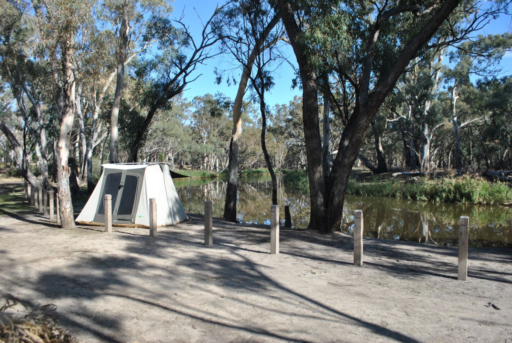 A small tent on the bank of the Wimmera River