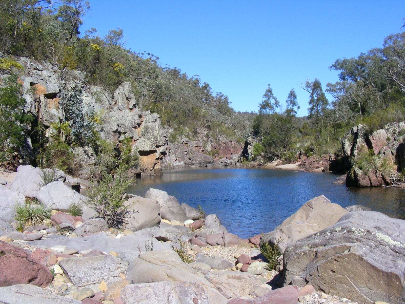 A view of the Channel Gorge with rocks in the foreground