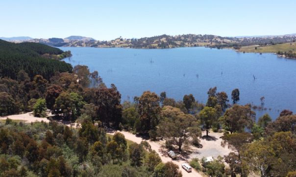 Aerial view of camping area with Lake Eildon in the background