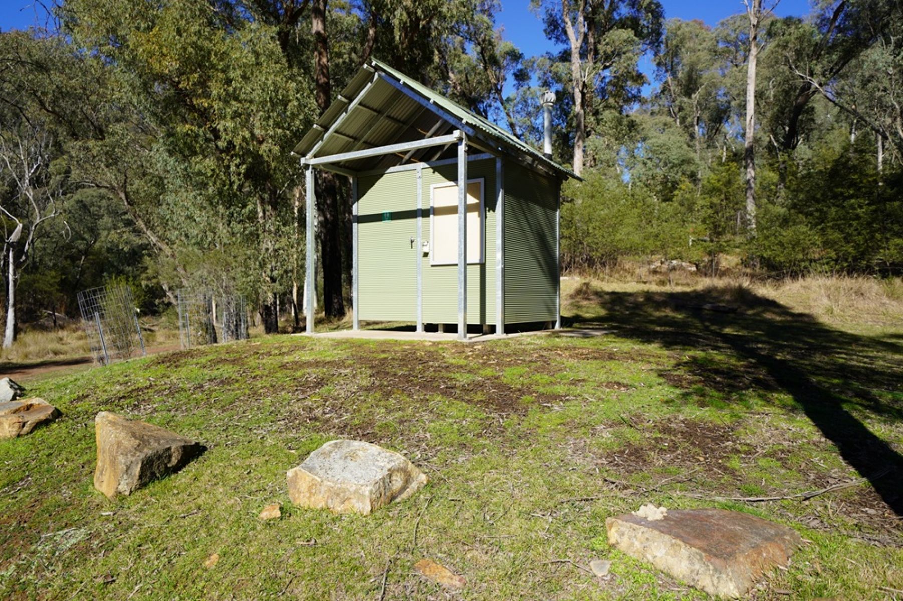Toilet in a grass clearing